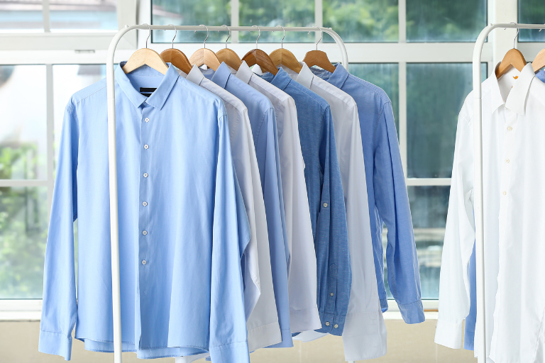 Pressed dress shirts on hangers