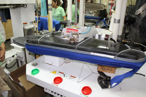 Garment press inside a Green Cleaners store