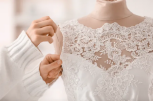 Close-up of lace on a white wedding dress